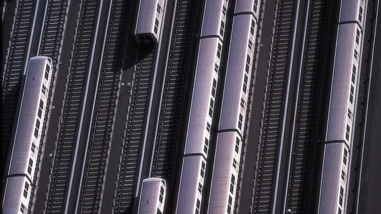 BART trains in a rail yard.