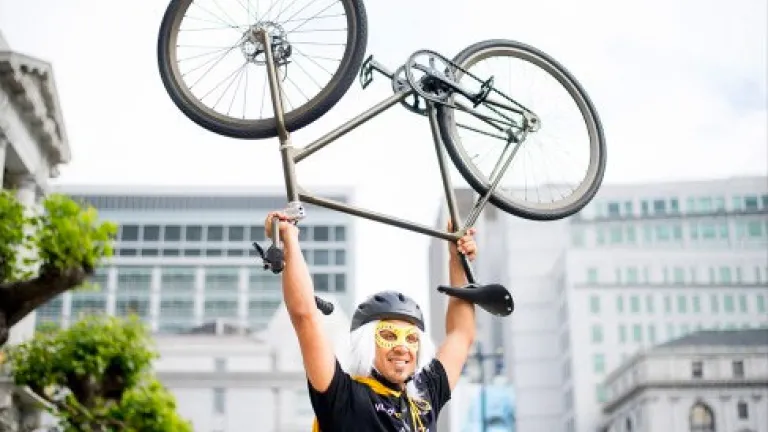 Dude holding a bike
