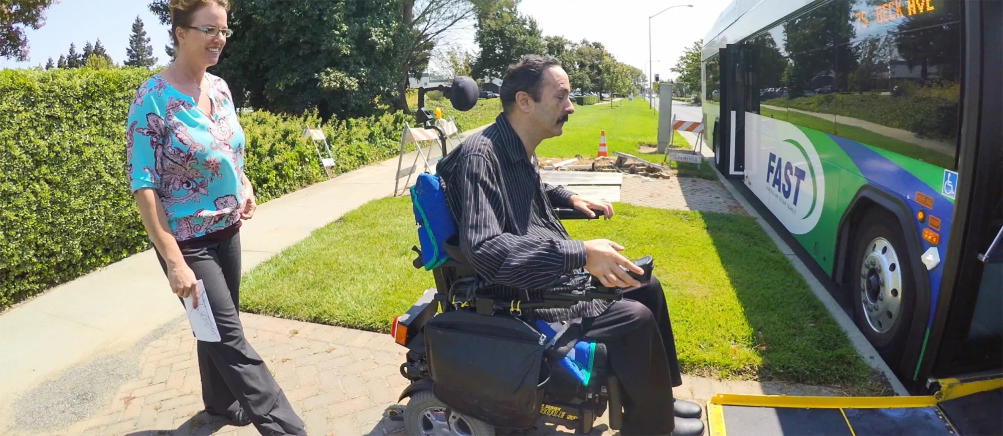 Wheelchair user boarding Solano Transportation Authority bus