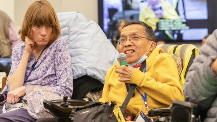 Policy Advisory Council member Roland Wong takes the mic at the Accessible Futures Conference.