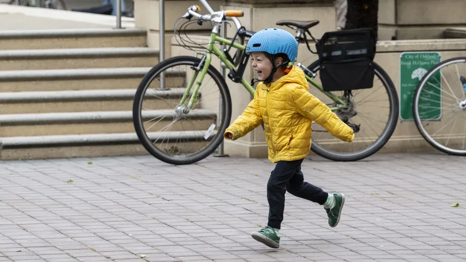An enthusiastic young cyclist on Bike to Work Day.