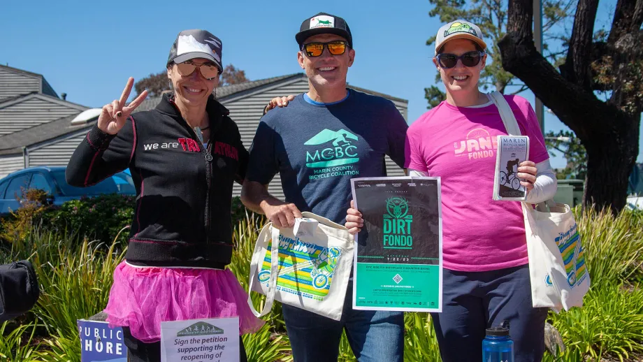 Marin County Bicycle Coalition volunteers smile for the camera on Bike to Work Day.