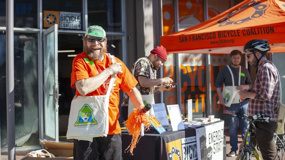 A smiling Bike to Work Day volunteer.