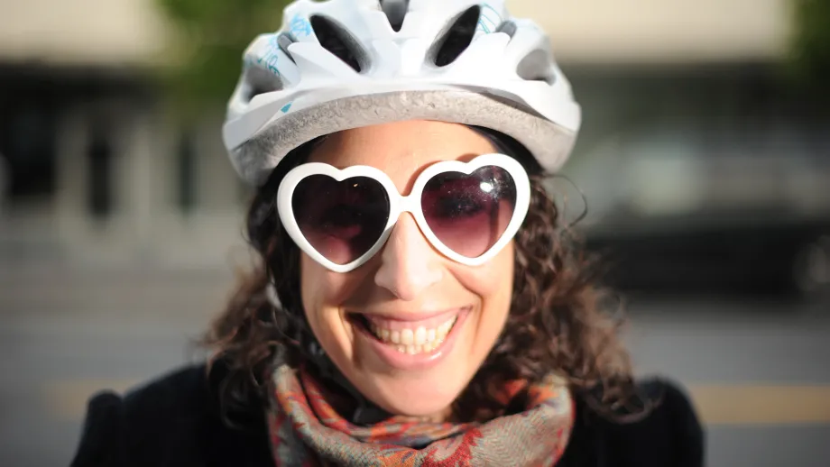 A stylish cyclist wearing heart-shaped sunglasses in 2013.