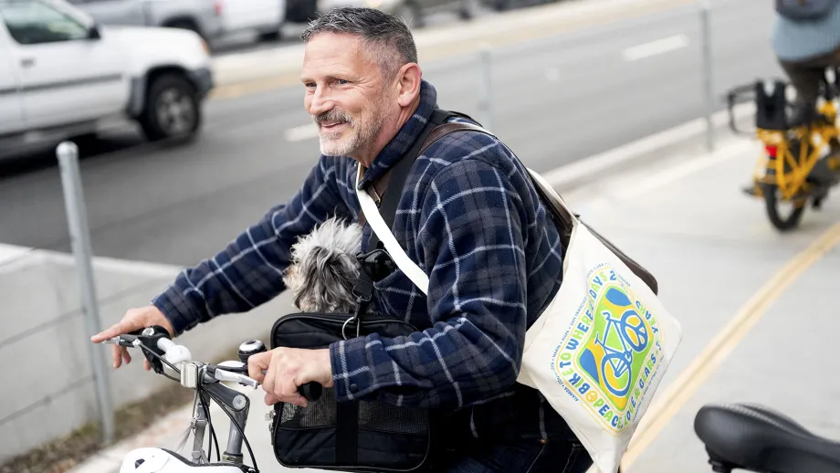 A cyclist and his dog at the Larkspur Bike to Work Day Energizer Station.