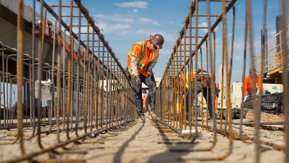 Berryessa BART Station: Worker Bret Fletcher reinforces rebar for parking structure.