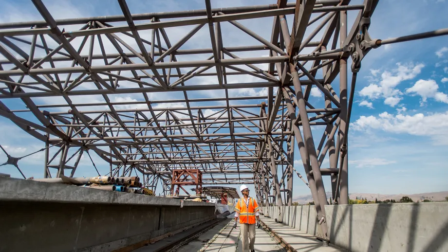 Berryessa BART Station: Worker inspects new aerial platforms.
