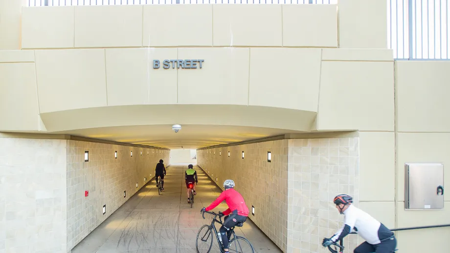 Bicyclists and pedestrians travel in the West B Street Undercrossing in Dixon