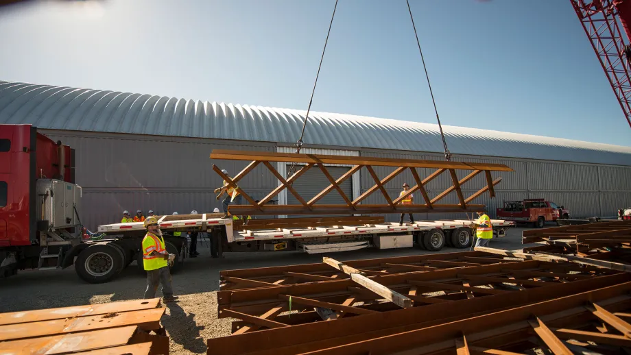 crane lifting steel beam