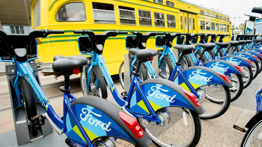 Line of go bikes on a stand