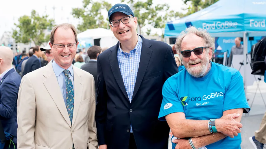 3 men posing for a picture