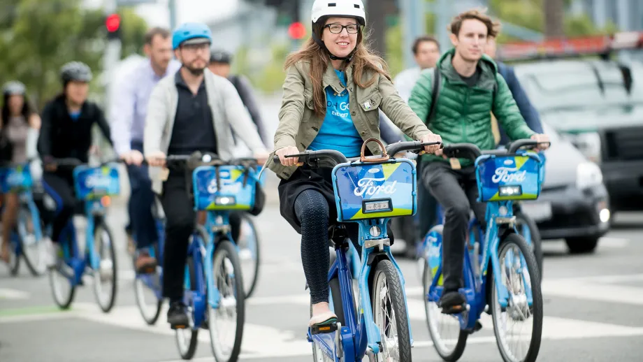 people trying out go bikes