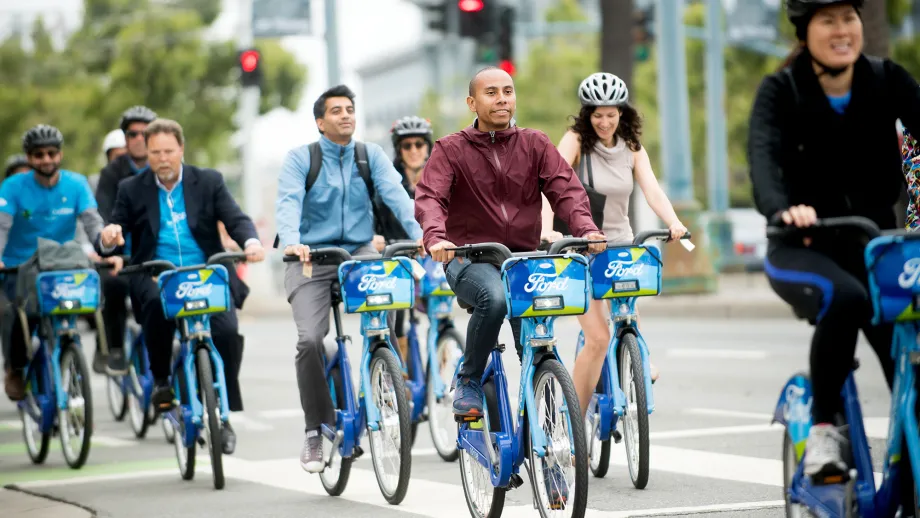 people trying out go bikes