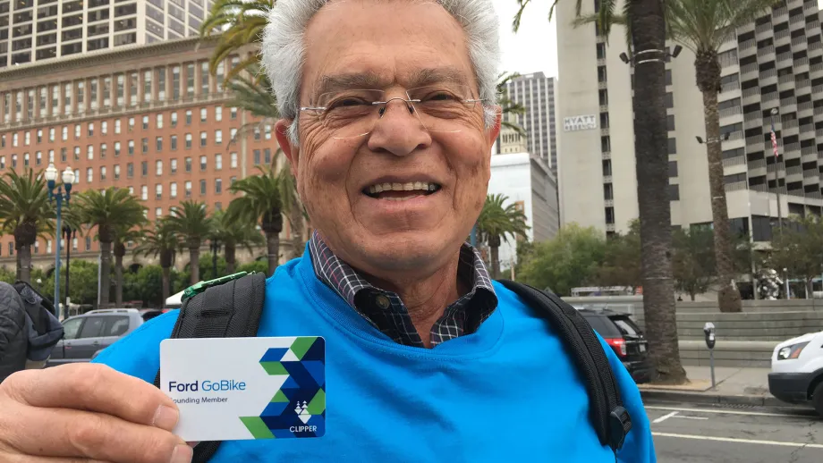 man holding a clipper card