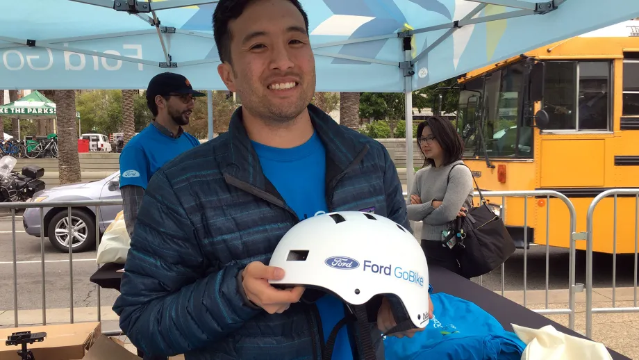 man holding a helmet