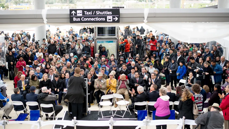 crowd sits inside at Warm Spring Station