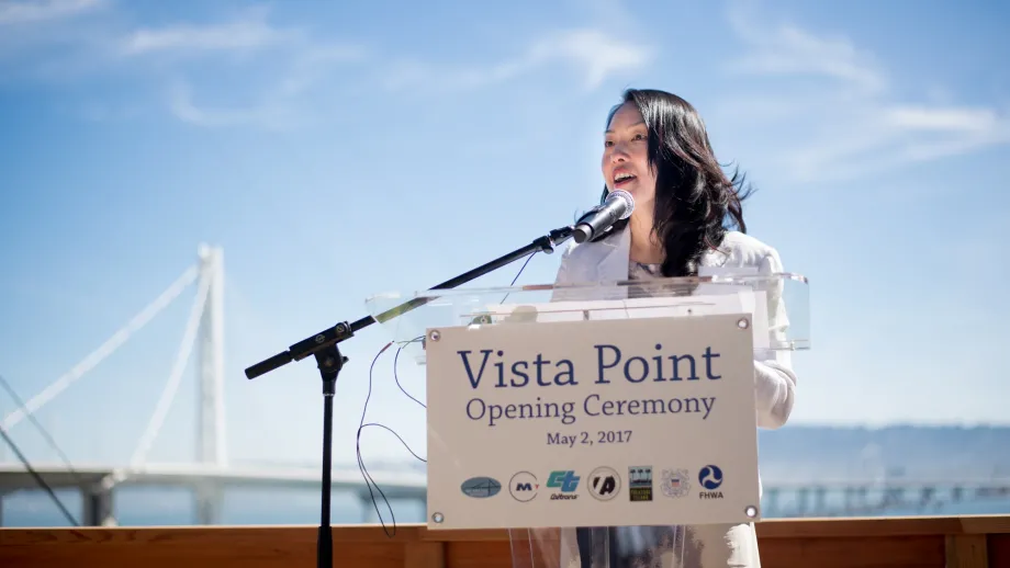 San Francisco Supervisor and MTC Commissioner Jane Kim speaking at podium