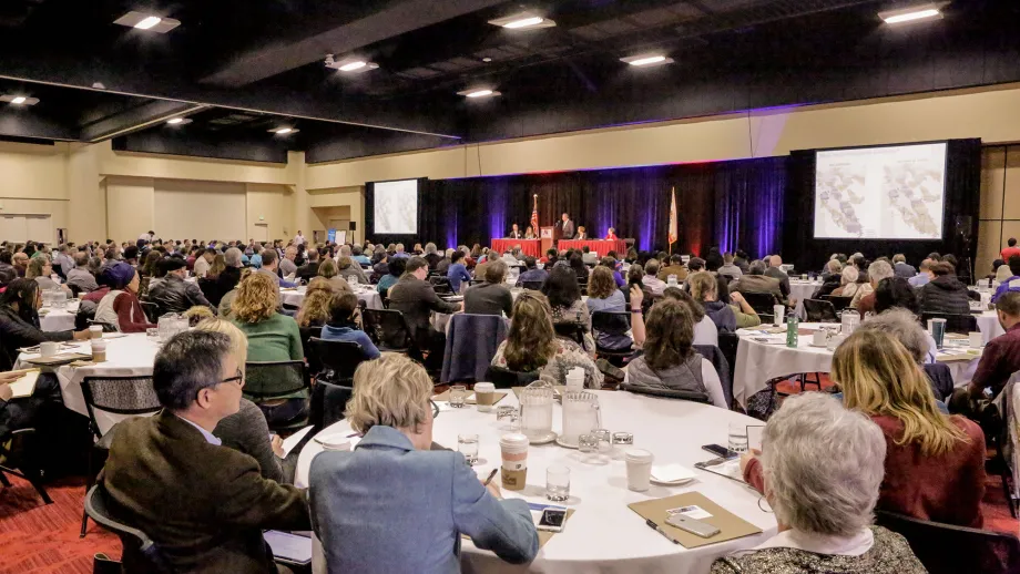 Attendees in the main conference room at the Oakland Marriott City Center.
