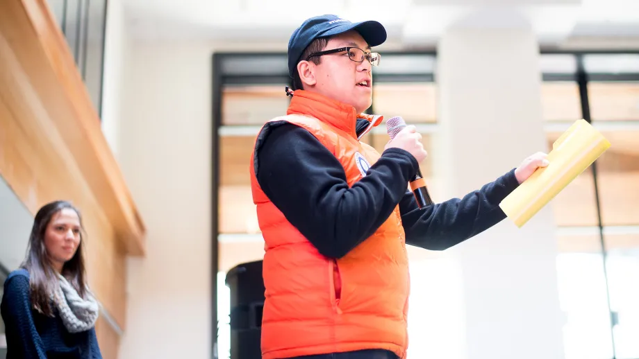 Man talking into a microphone