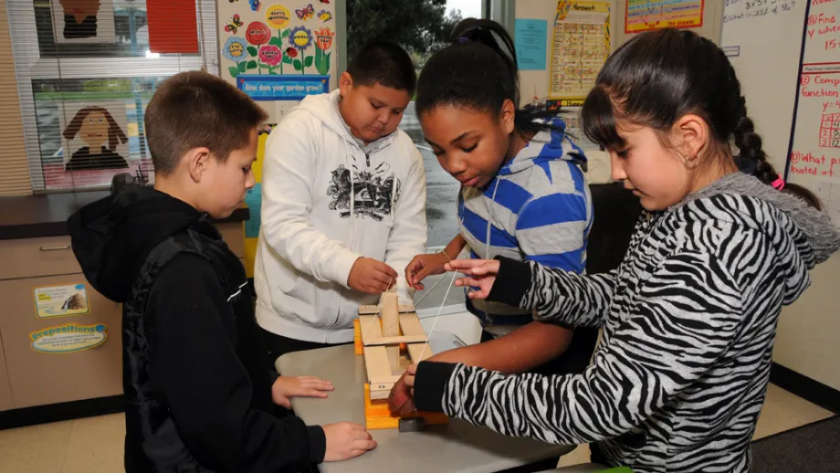 Fifth-graders putting the pieces together