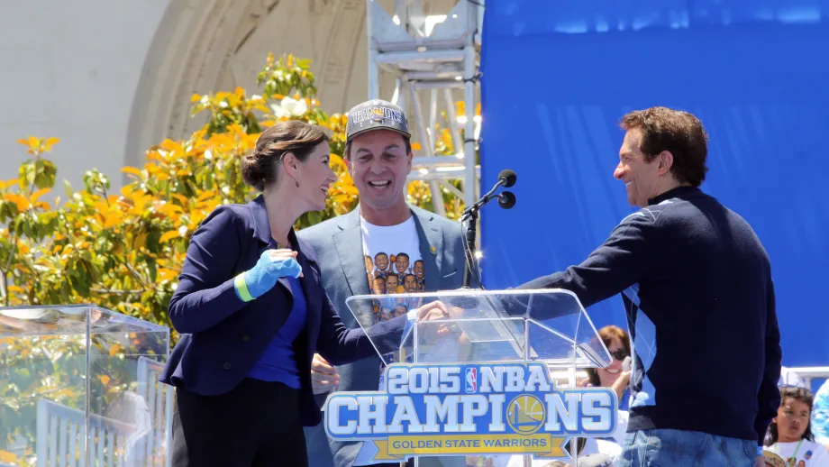 Mayor Schaaf greets Warriors co-owner Peter Gruber.