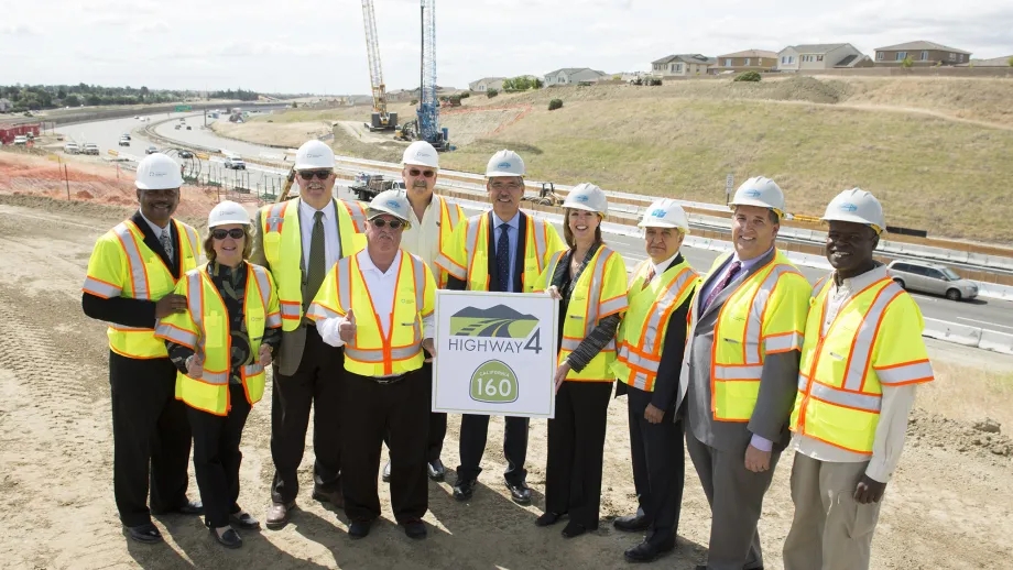 Officials take part in the groundbreaking ceremony for the SR 160/Hwy. 4 direct connector ramps project. 