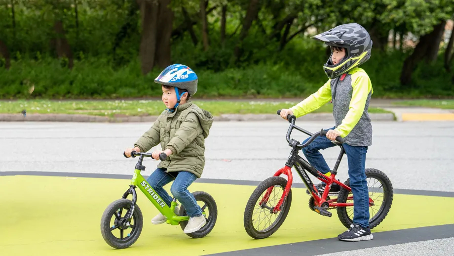 Two children on bicycles.