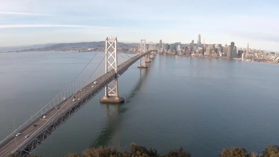 Aerial view of the San Francisco-Oakland Bay Bridge with very light traffic