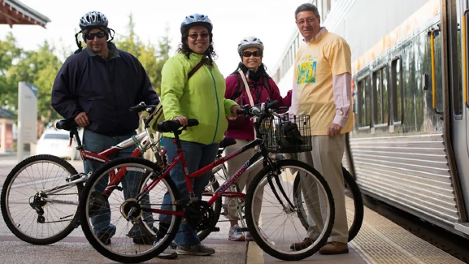 MTC Commissioner Jim Spering welcomes bicycle commuters to the Suisun City Amtrak Station 